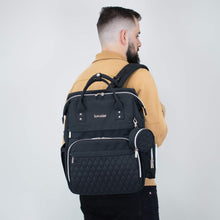 Load image into Gallery viewer, Man wearing the Black Diaper Bag CRUZ - Lovatte Shop